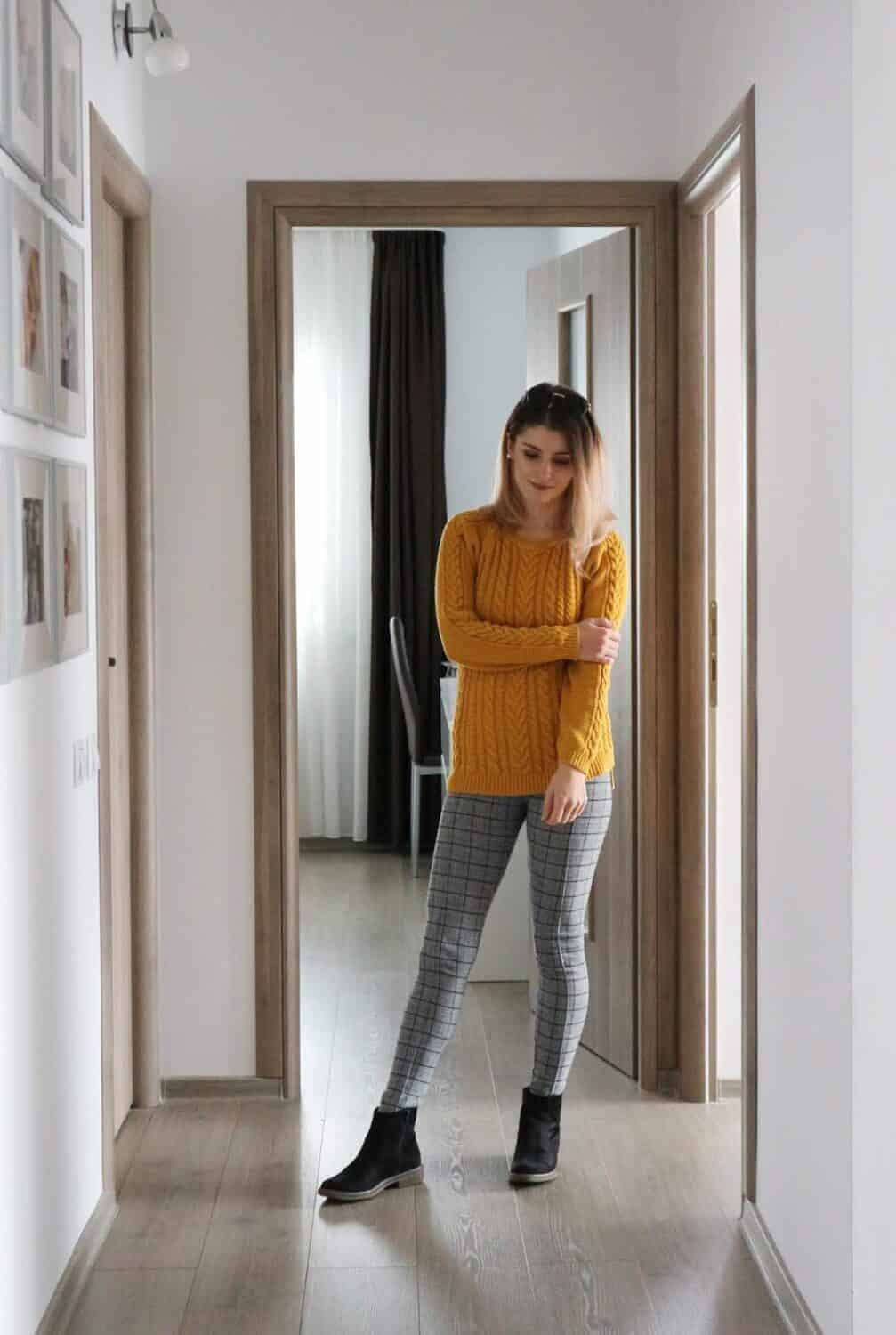 mustard sweater and checked leggings outfit