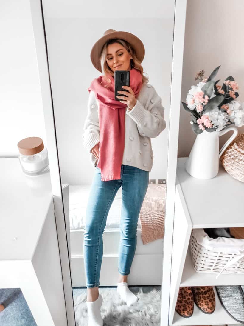 outfit with pink scarf camel hat and pompom sweater Zara