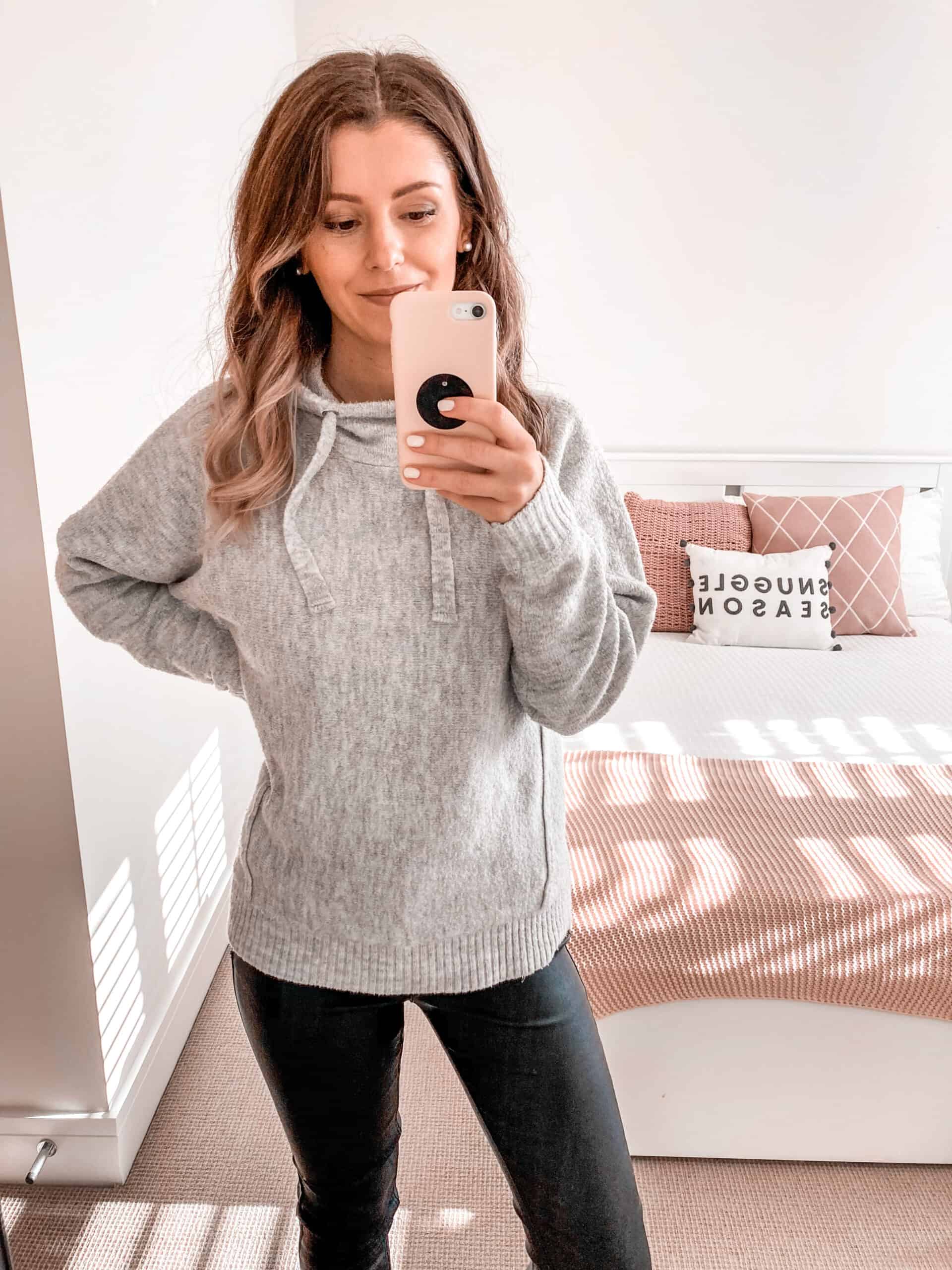 Grey knit hoodie coated jeans black trainers autumn outfit